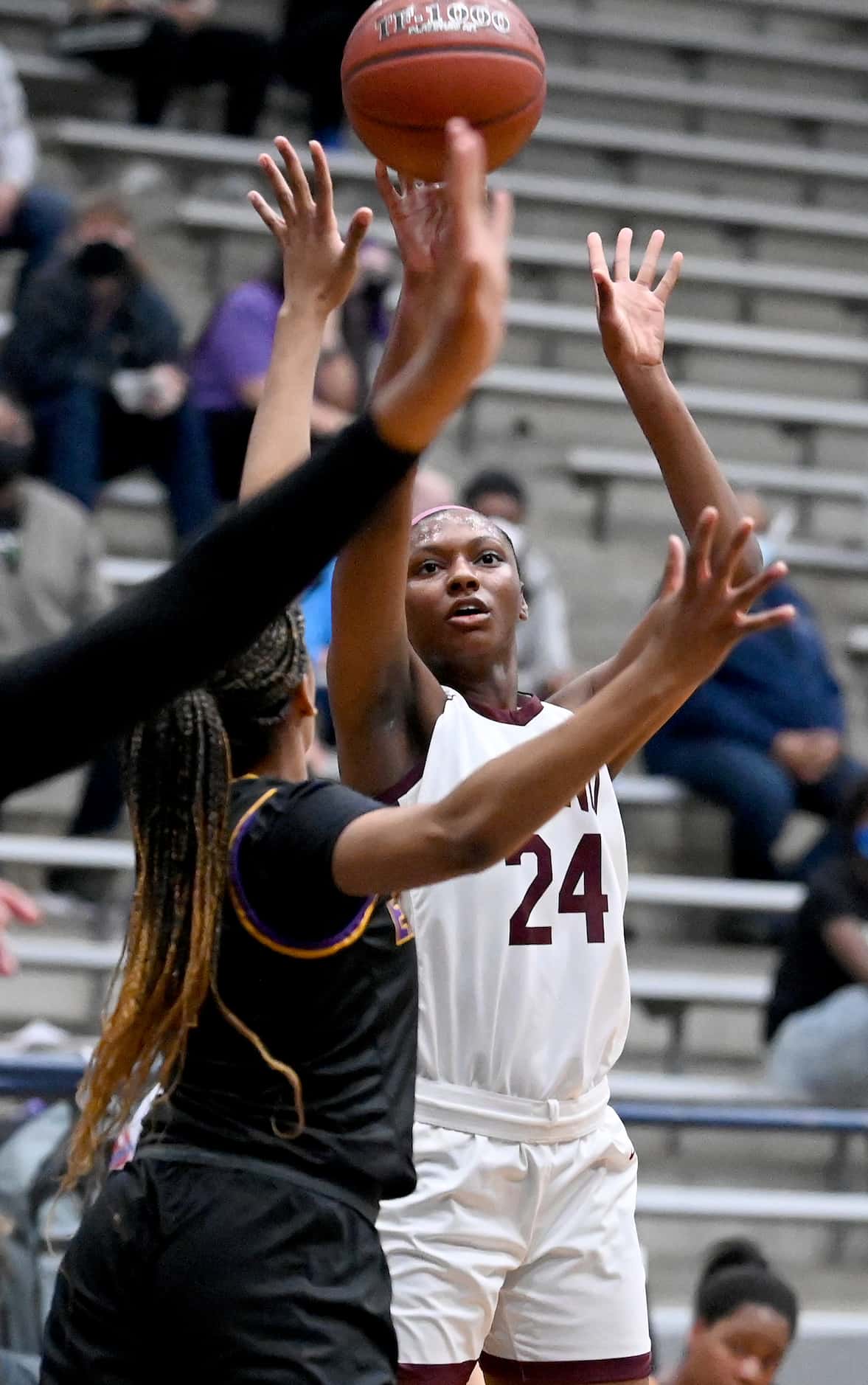 Plano’s Amaya Brannon (24) shoots in traffic in the first half of a Class 6A girls high...