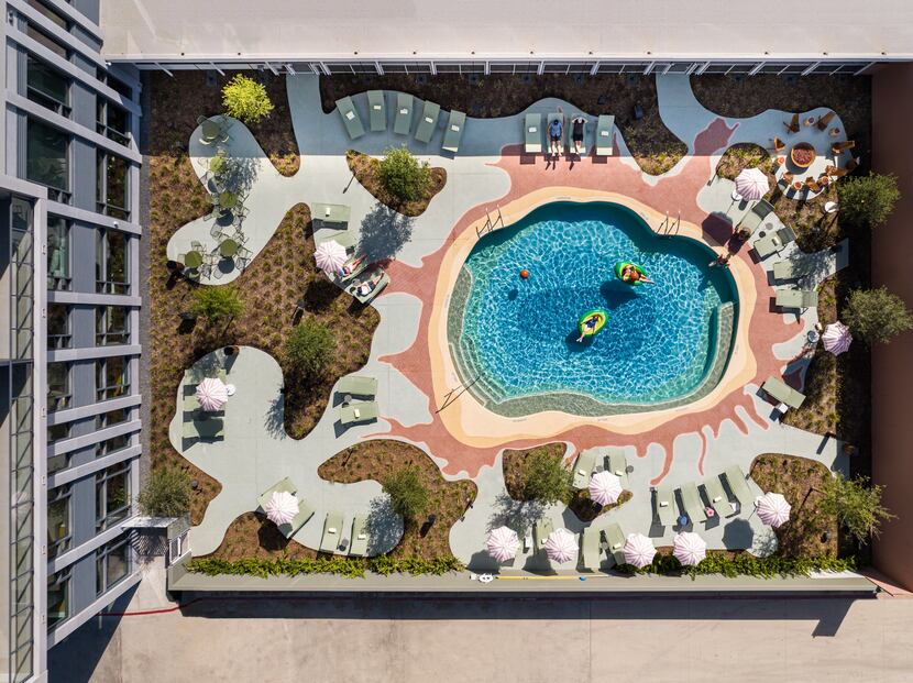 The swimming pool and gardens at the Urby towers.