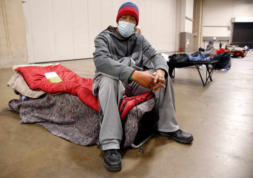 Pierre Scott, a 59 year-old guest and volunteer at a warming center run by OurCalling, is...