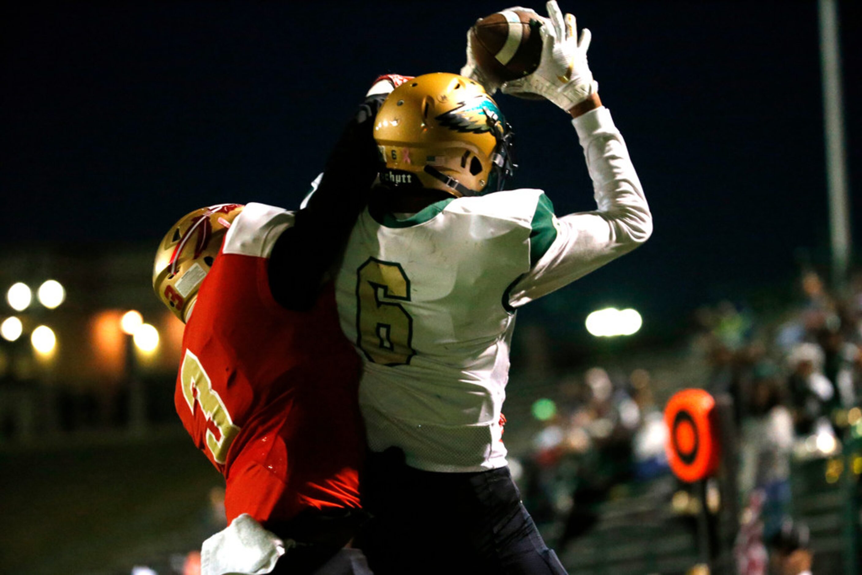 Desoto's Lawrence Arnold Jr. (6) catches a touchdown against South Grand Prairie's Earl Pugh...