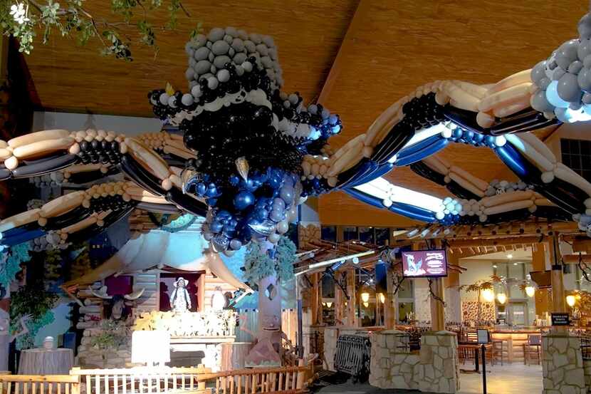 A spider made of 4,040 balloons greets guests in the lobby during Great Wolf Lodge's...