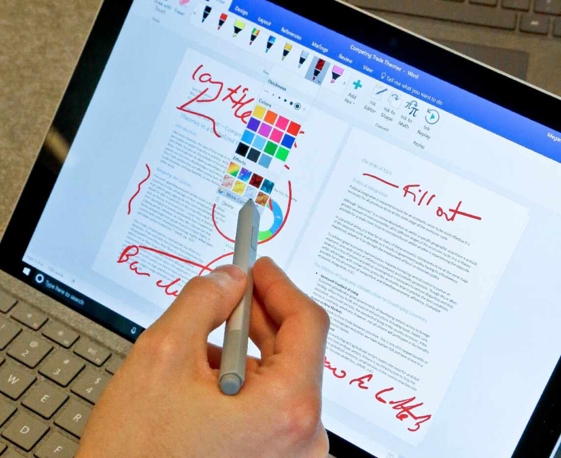  Microsoft's new Surface Pro laptop-tablet hybrid is displayed in New York. Its stylus will...