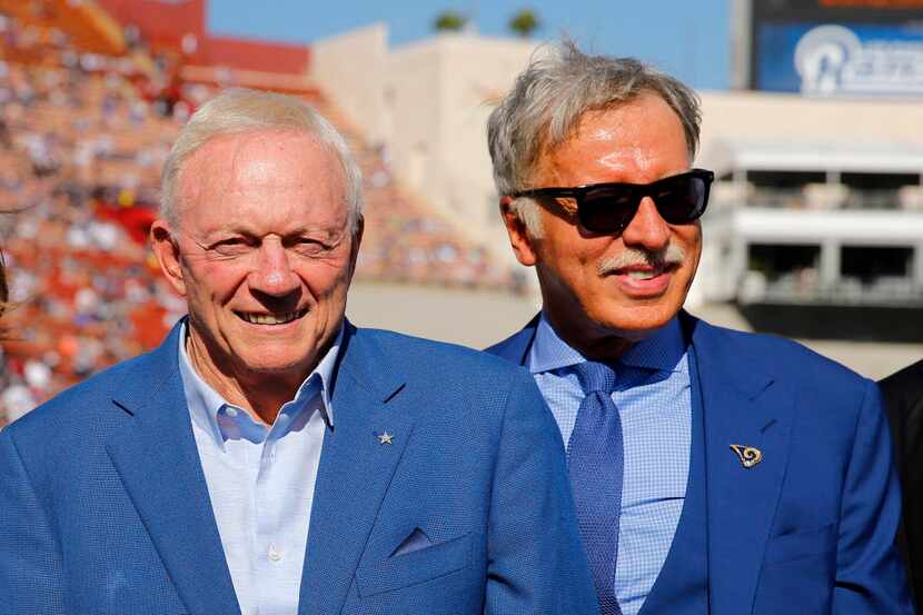 Dallas Cowboys owner Jerry Jones and Los Angeles Rams owner Stan Kroenke pose for photos...