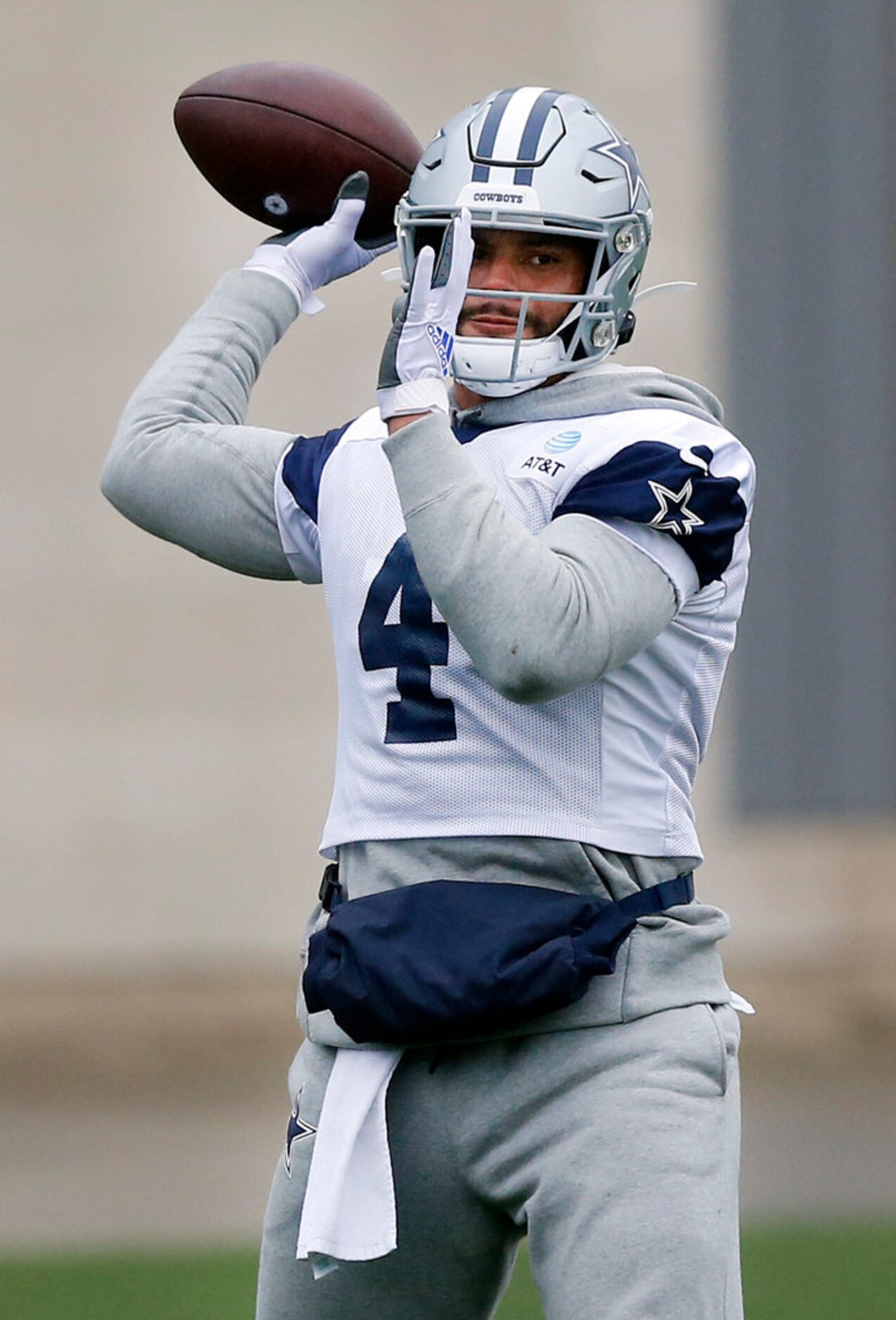 Dallas Cowboys quarterback Dak Prescott (4) throws passes during practice at The Star in...