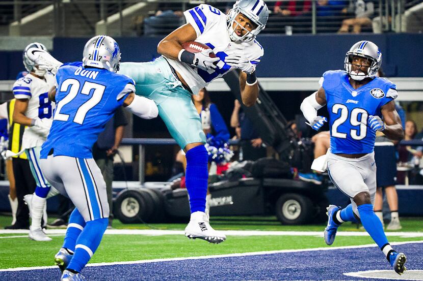 Dallas Cowboys wide receiver Brice Butler (19) catches a 21-yard touchdown pass as Detroit...