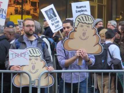  Protesters outside aÂ GOP gala in midtown Manhattan on Thursday night aimed most of their...