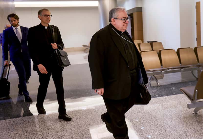 Bishop Micheal Olson enters the 67th District Court in the Tom Vandergriff Civil Courts...