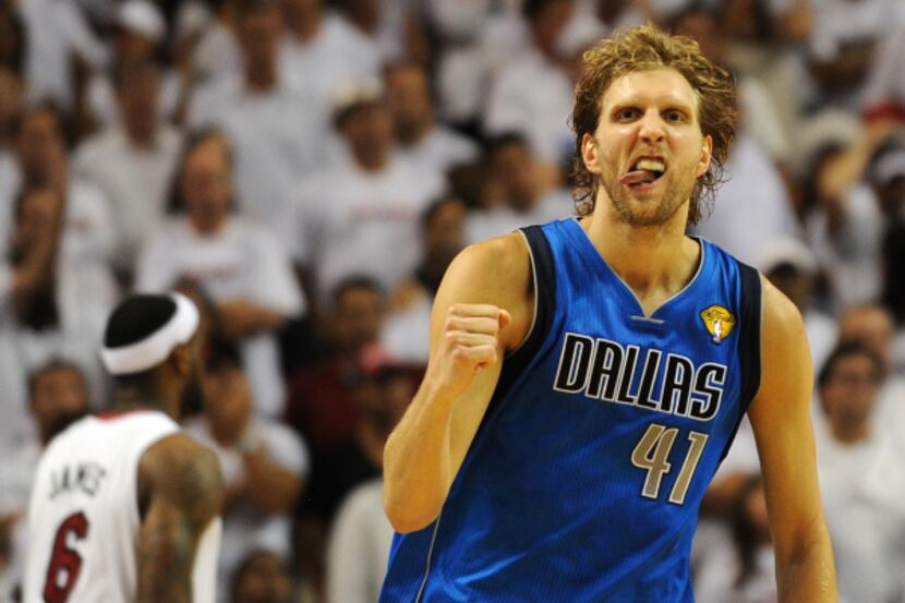 Dirk Nowitzki  celebrates a point against the Miami Heat in Game 6 of the NBA Finals in June.