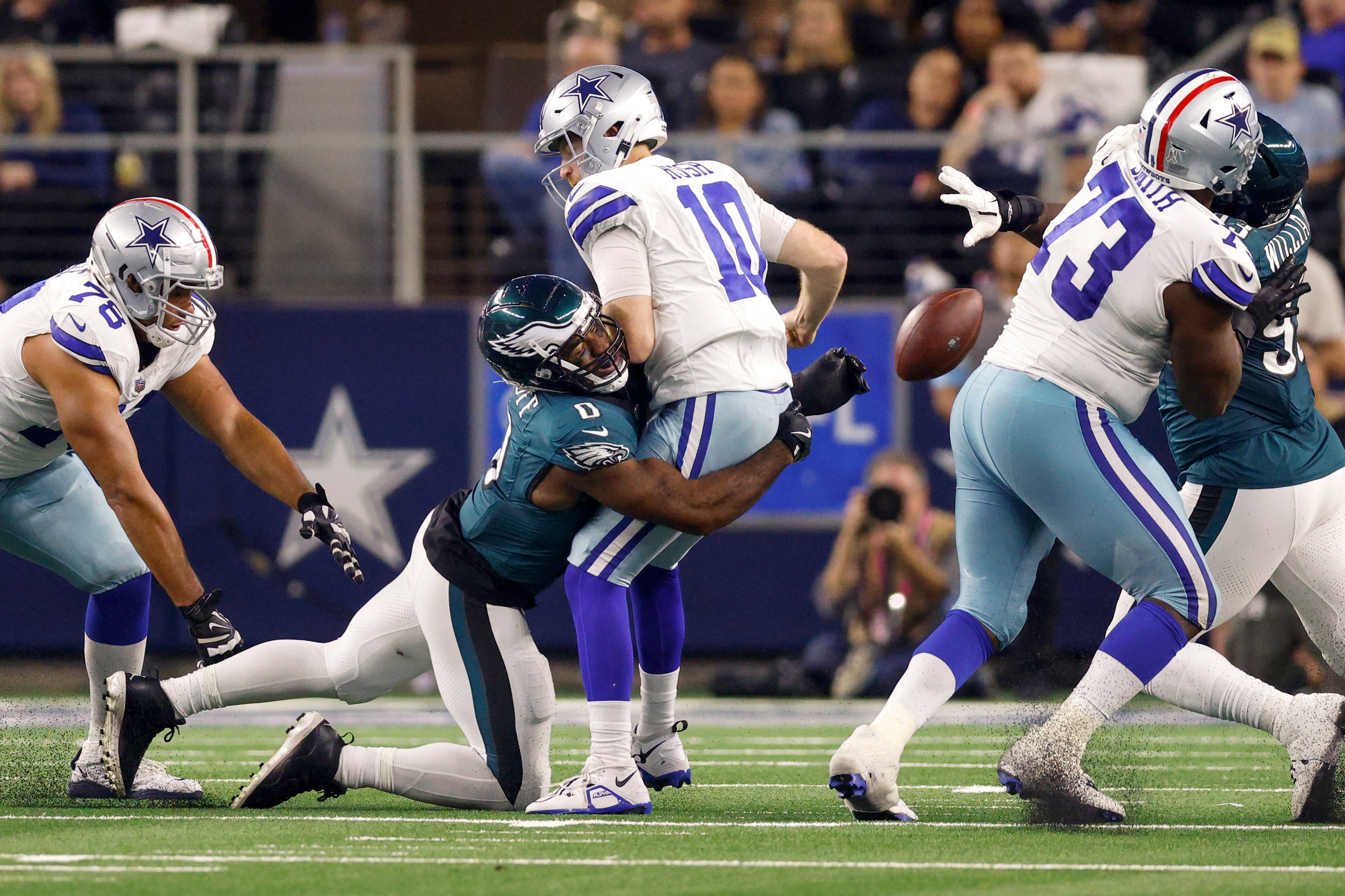 Philadelphia Eagles defensive end Bryce Huff (0) sacks Dallas Cowboys quarterback Cooper...