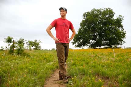 Farmer Thomas Locke walks the third-generation, 160-acre  Bois d'Arc farm he and his uncle...