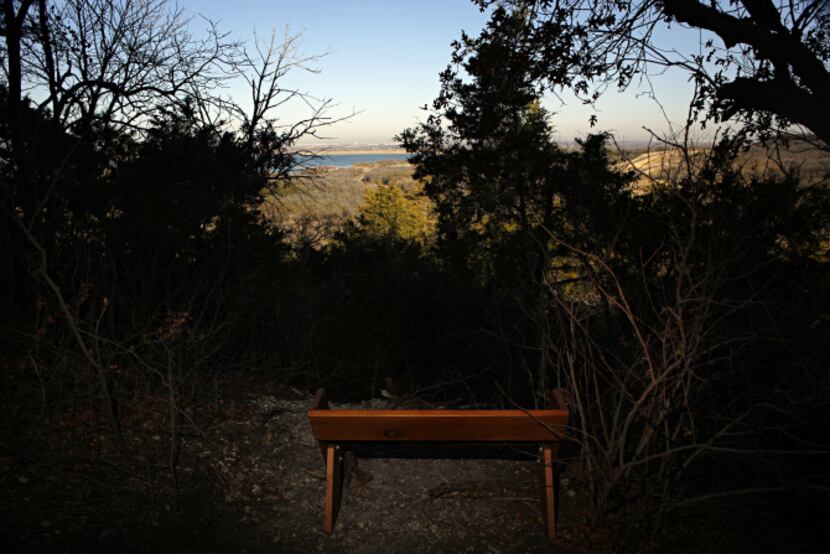 A bench built by local Eagle Scouts overlooks the view of Joe Pool Lake at the Dogwood...
