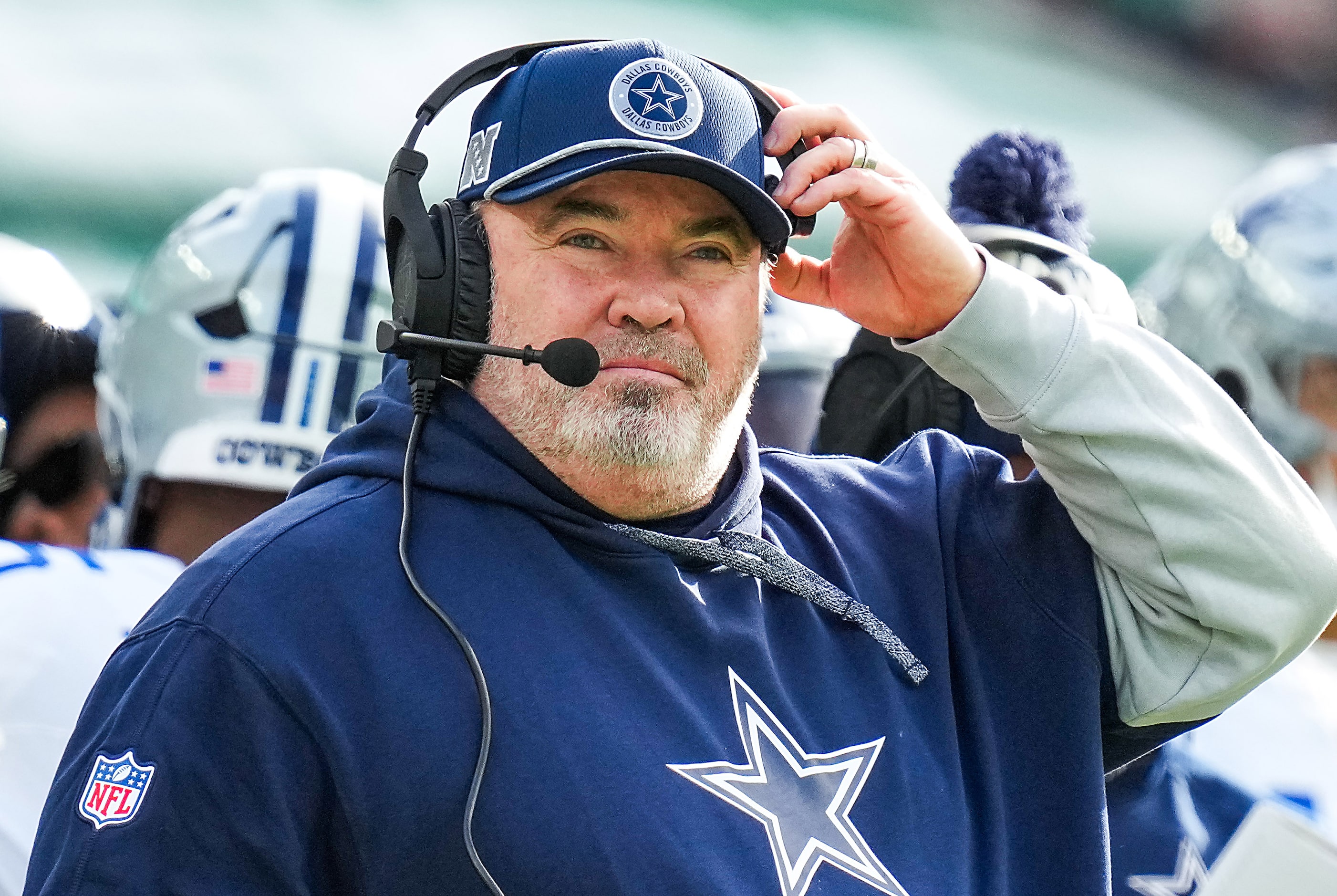 Dallas Cowboys head coach Mike McCarthy looks on from the bench during the first half of an...