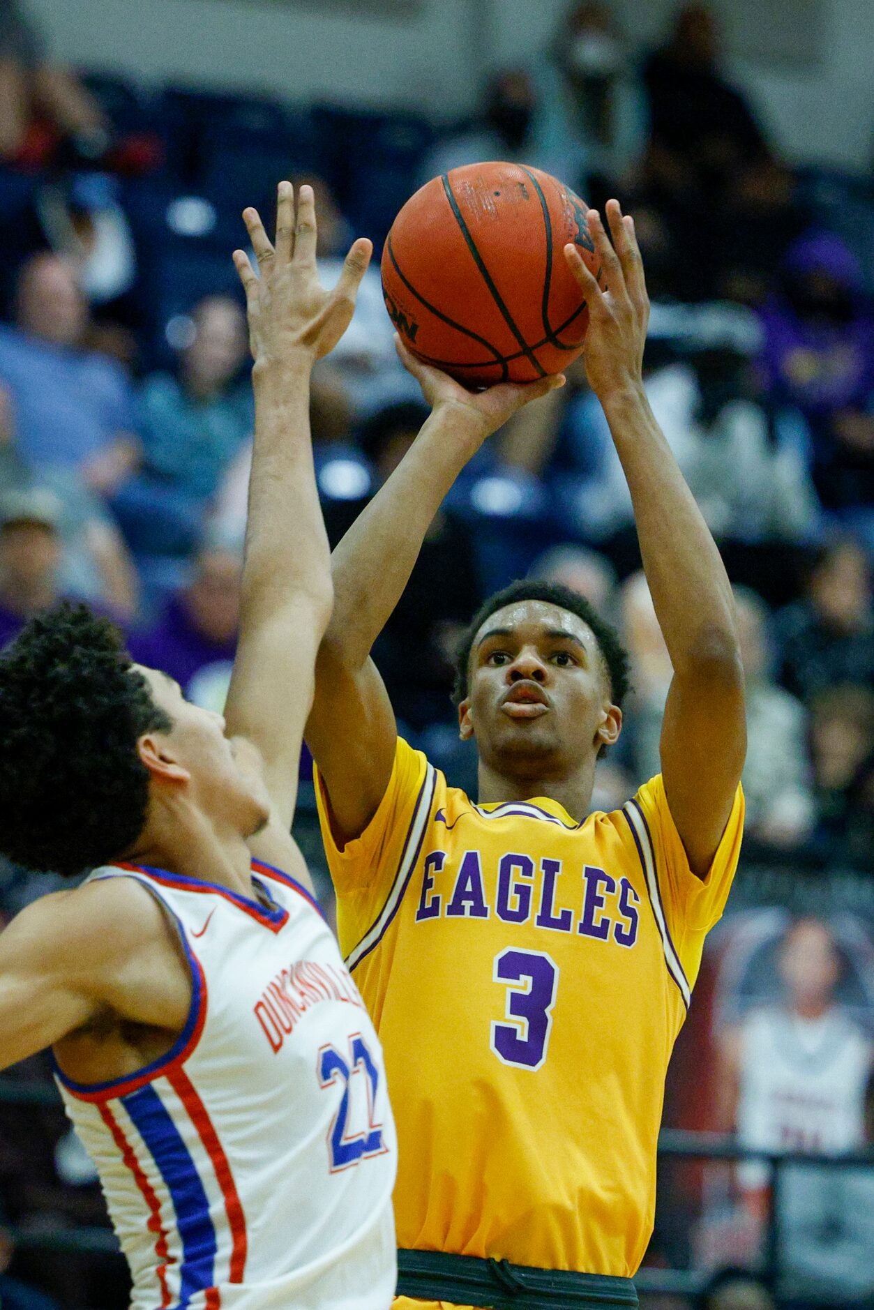 Richardson guard Rylan Griffen (3) attempts a shot over Duncanville forward Davion Sykes...