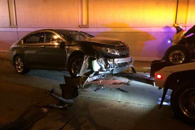  A car was towed after its driver crashed on Dallas North Tollway early Saturday. (NBC5)
