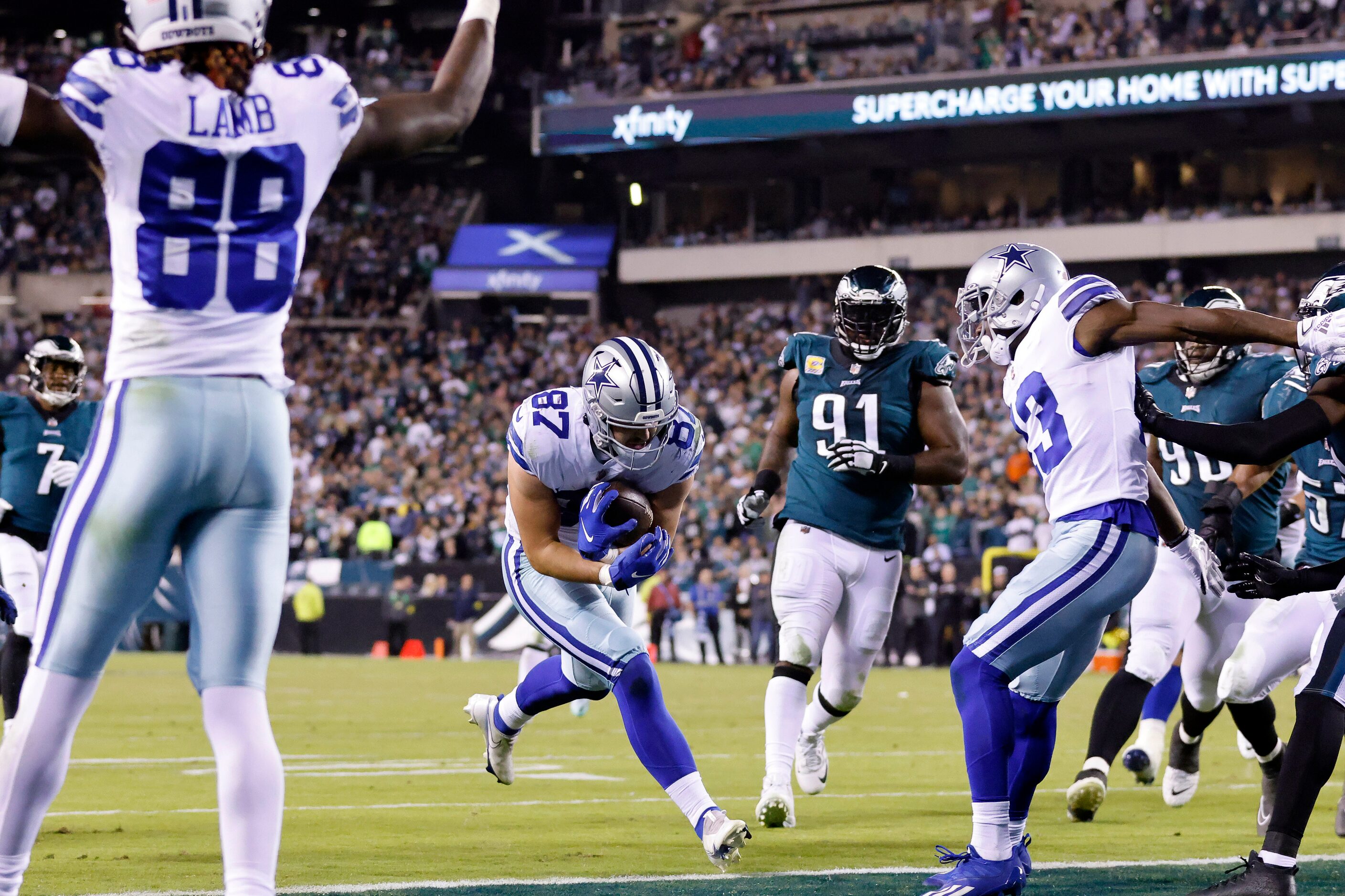 Dallas Cowboys tight end Jake Ferguson (87) scores a fourth quarter touchdown against...