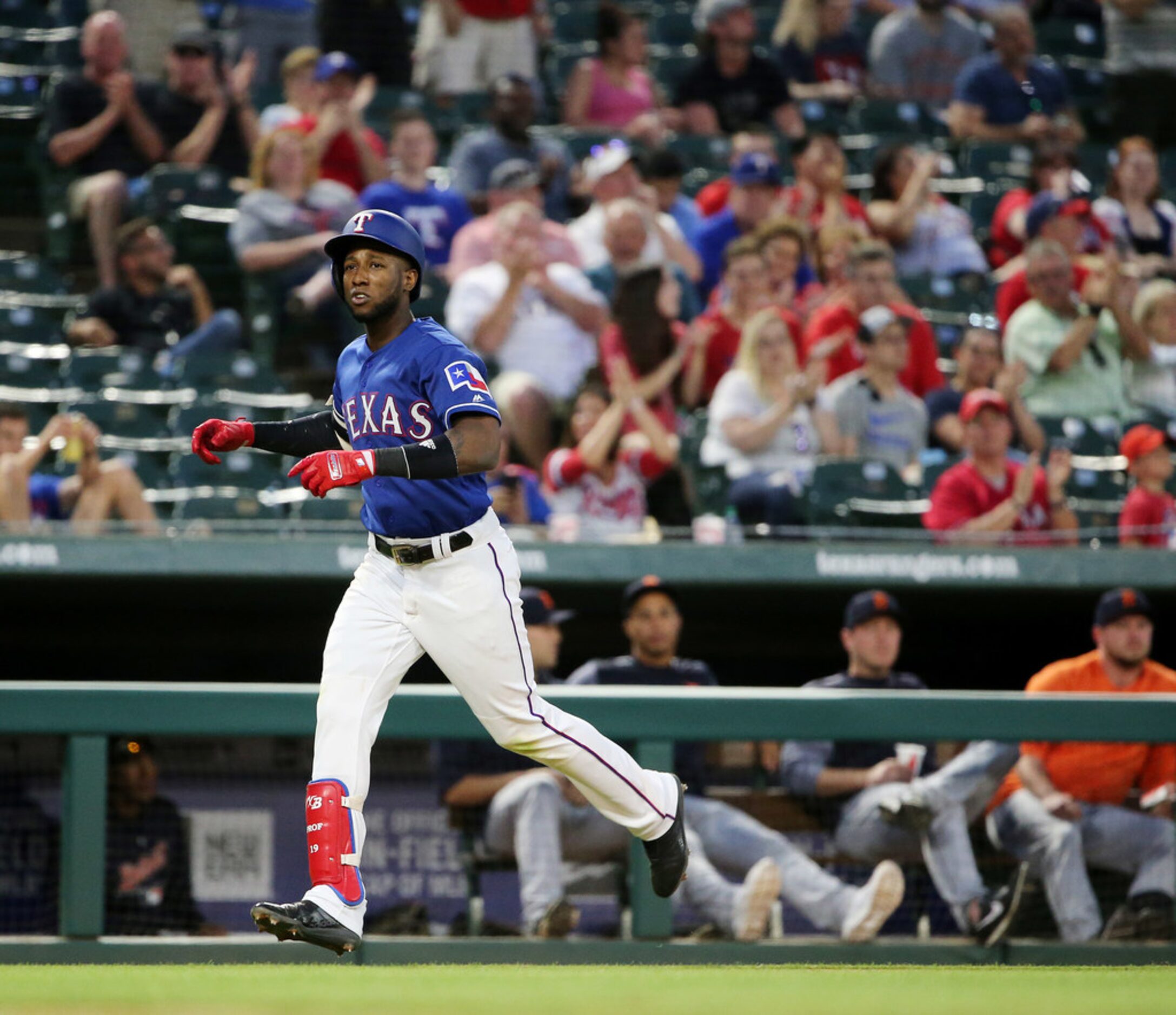 Texas Rangers shortstop Jurickson Profar (19) hits a home run to make the score 1-5 during...