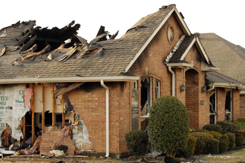 A home in the 6100 block of Arlington Drive in Frisco was badly damaged after a fire that...