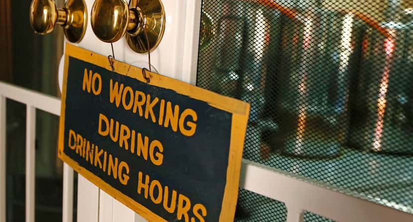 
A sign in the front of the bewing room at Four Bullets Brewery welcomes guests to relax and...