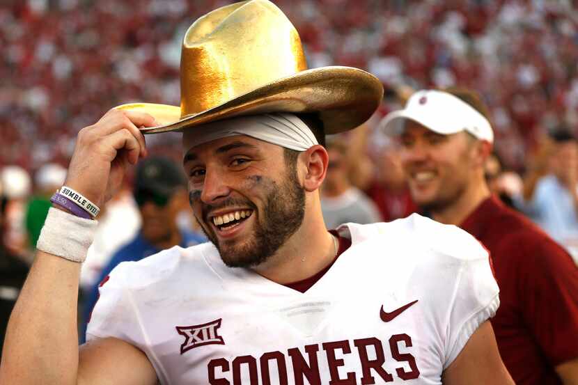 FILE - In this Oct. 14, 2017, file photo, Oklahoma quarterback Baker Mayfield (6) celebrates...