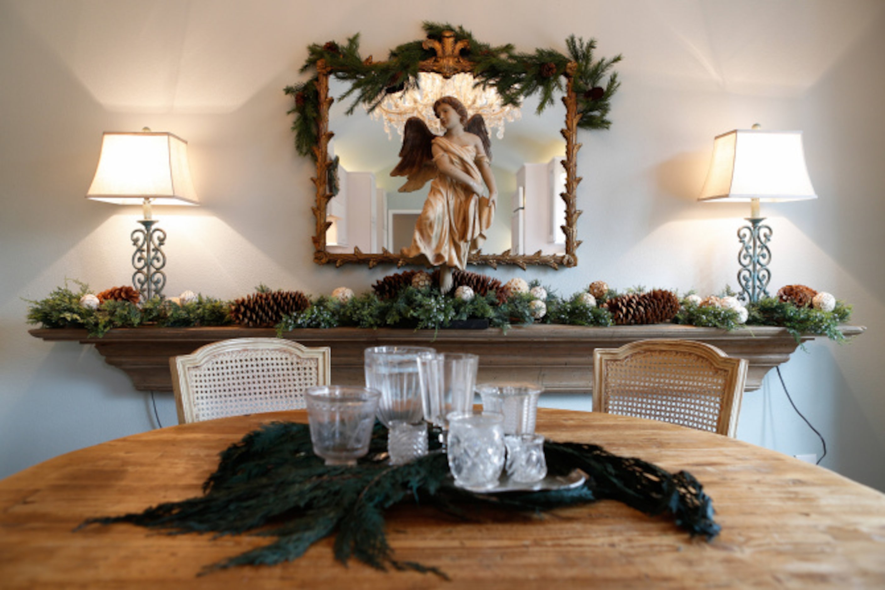 For the holidays, Druebert layers in plenty of greenery and natural elements, such as...