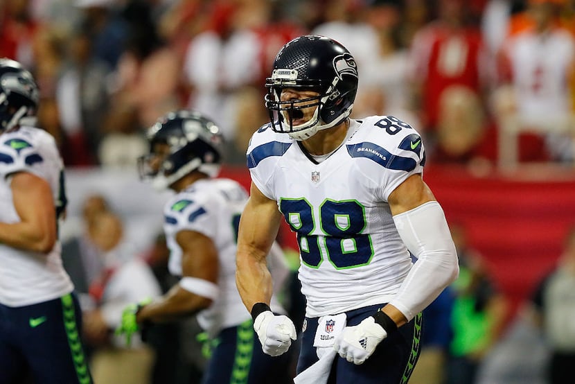 ATLANTA, GA - JANUARY 14:  Jimmy Graham #88 of the Seattle Seahawks reacts after scoring a...