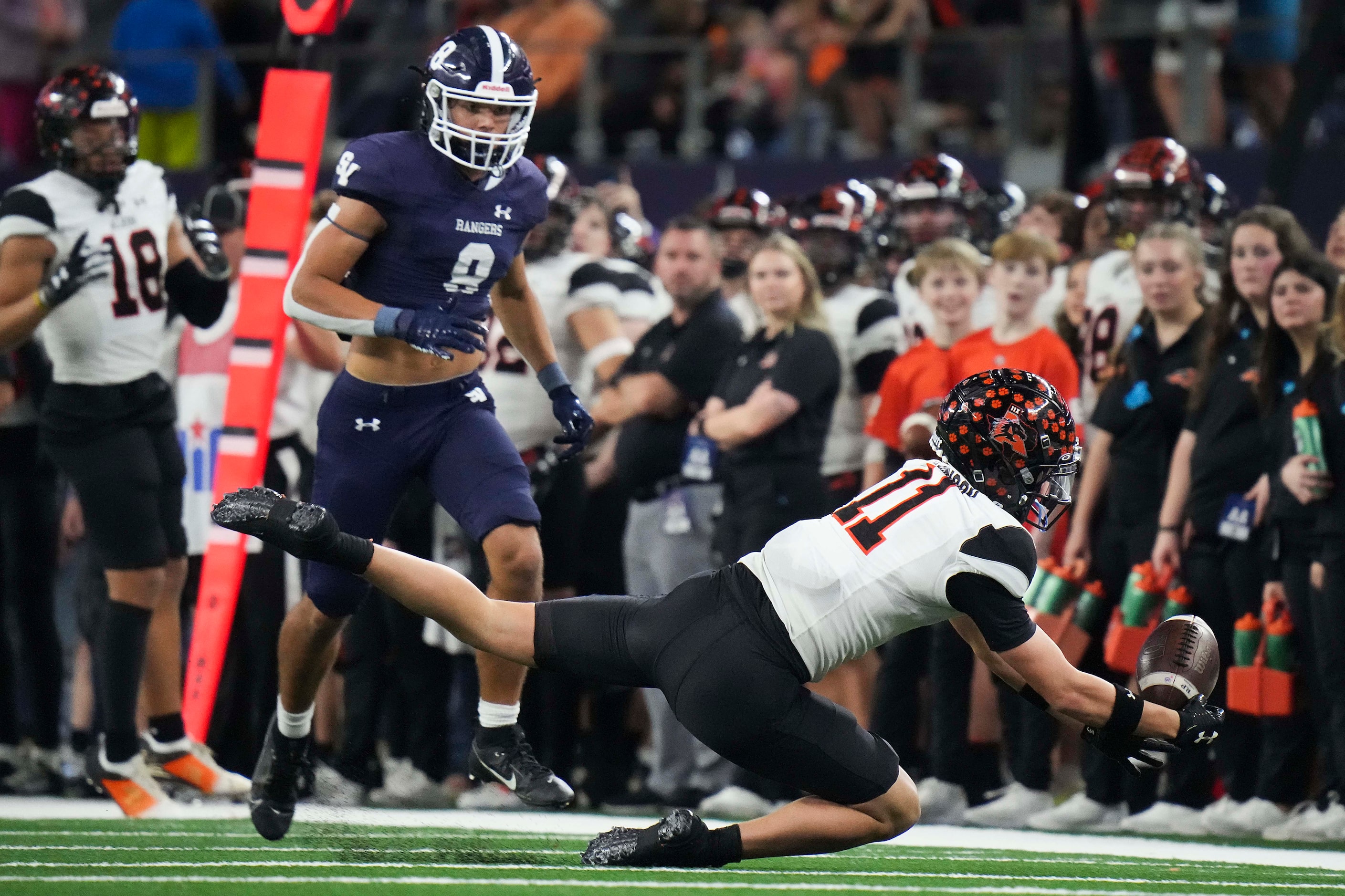 Aledo wide receiver Trace Clarkson (11) dives for a pass as Comal Smithson Valley defensive...