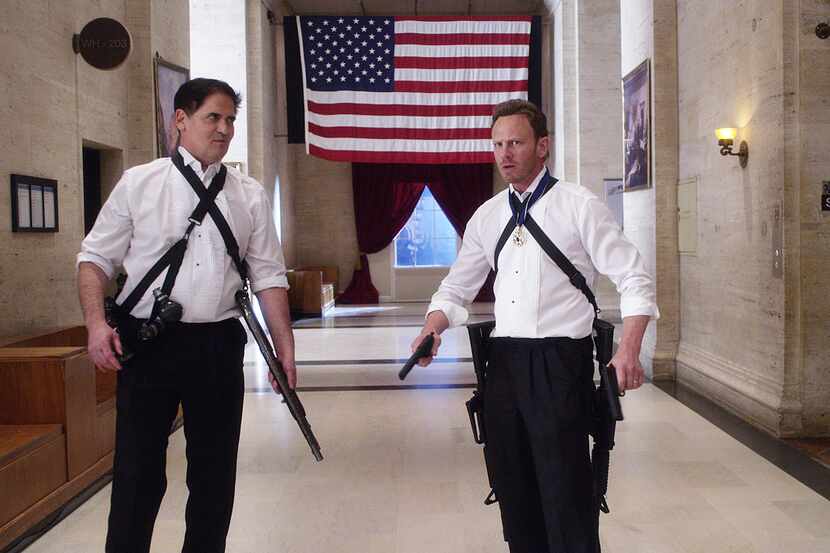 Mark Cuban (as U.S. President Marcus Robbins) and Ian Ziering (Fin Shepard) are...