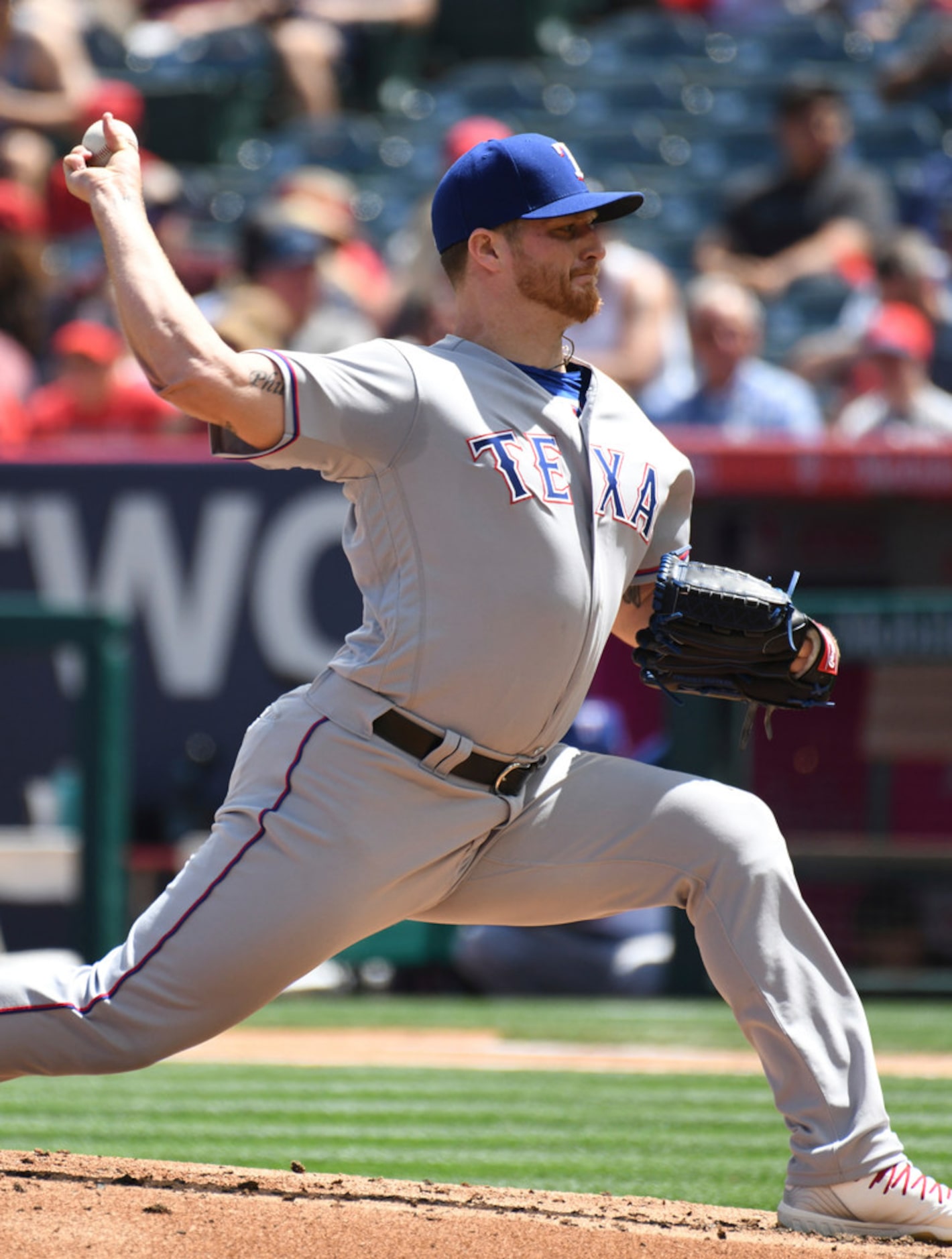 Texas Rangers pitcher Shelby Miller throws during the first inning of the team's baseball...