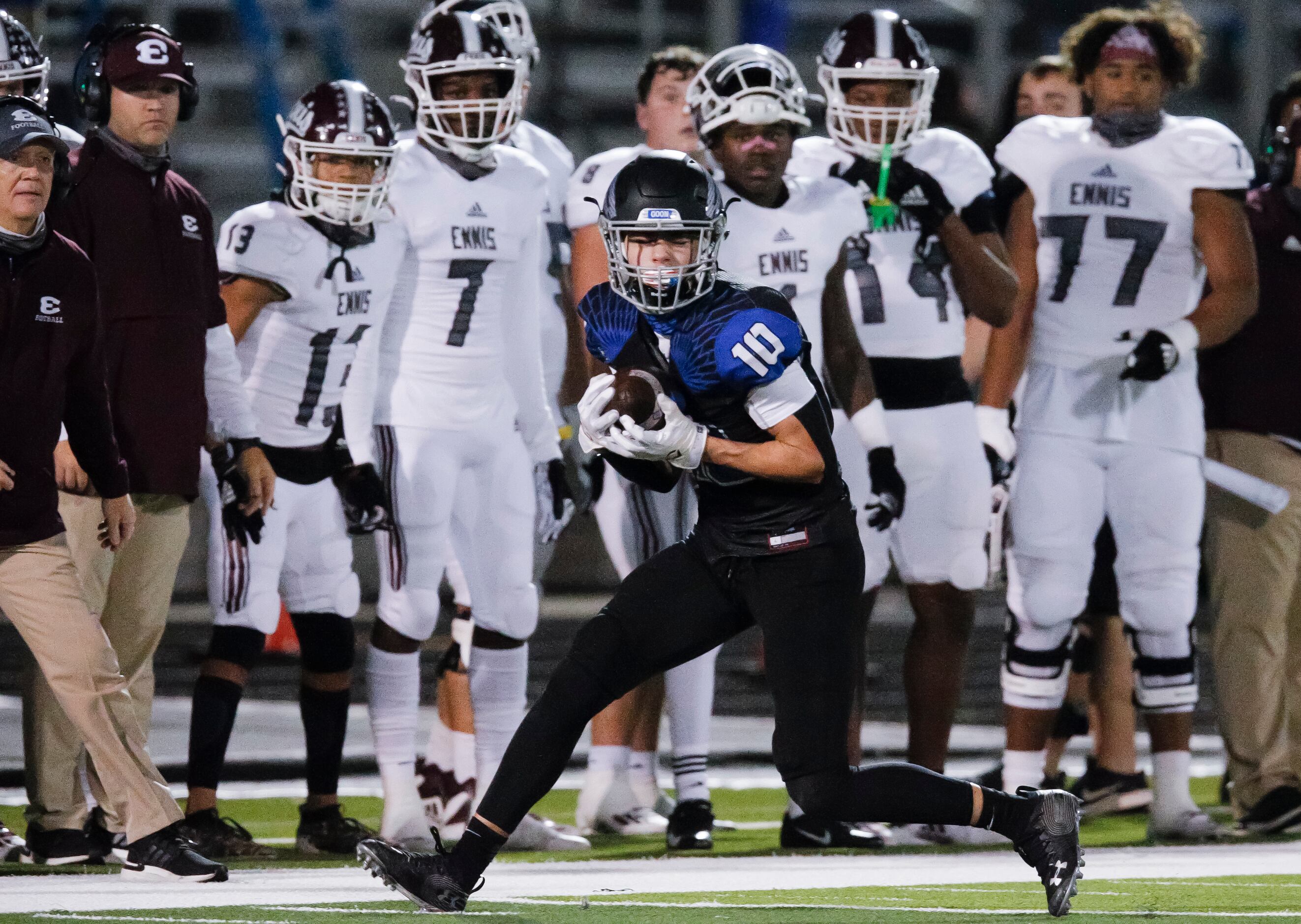 North Forney junior wide receiver Tyler Tucker catches a pass during the first half of a...