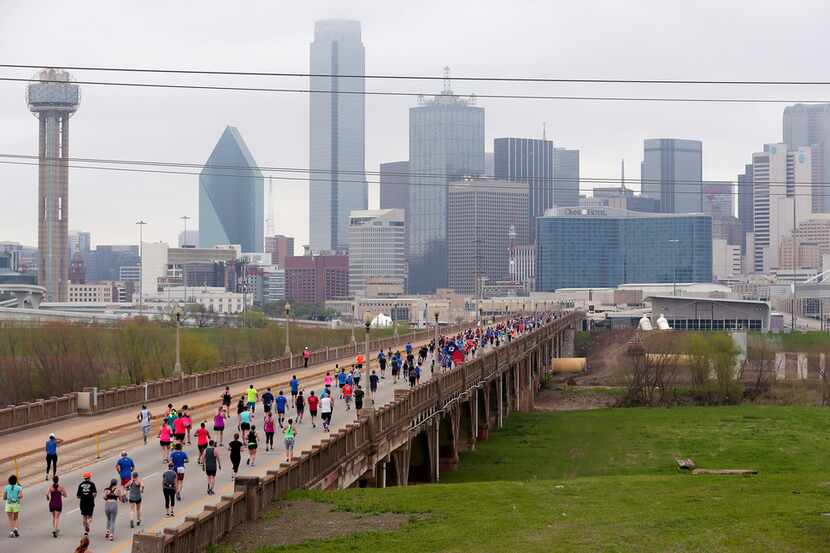 DALLAS, TX - MARCH 25:  Runners compete during the Toyota Rock 'N' Roll Dallas Half Marathon...