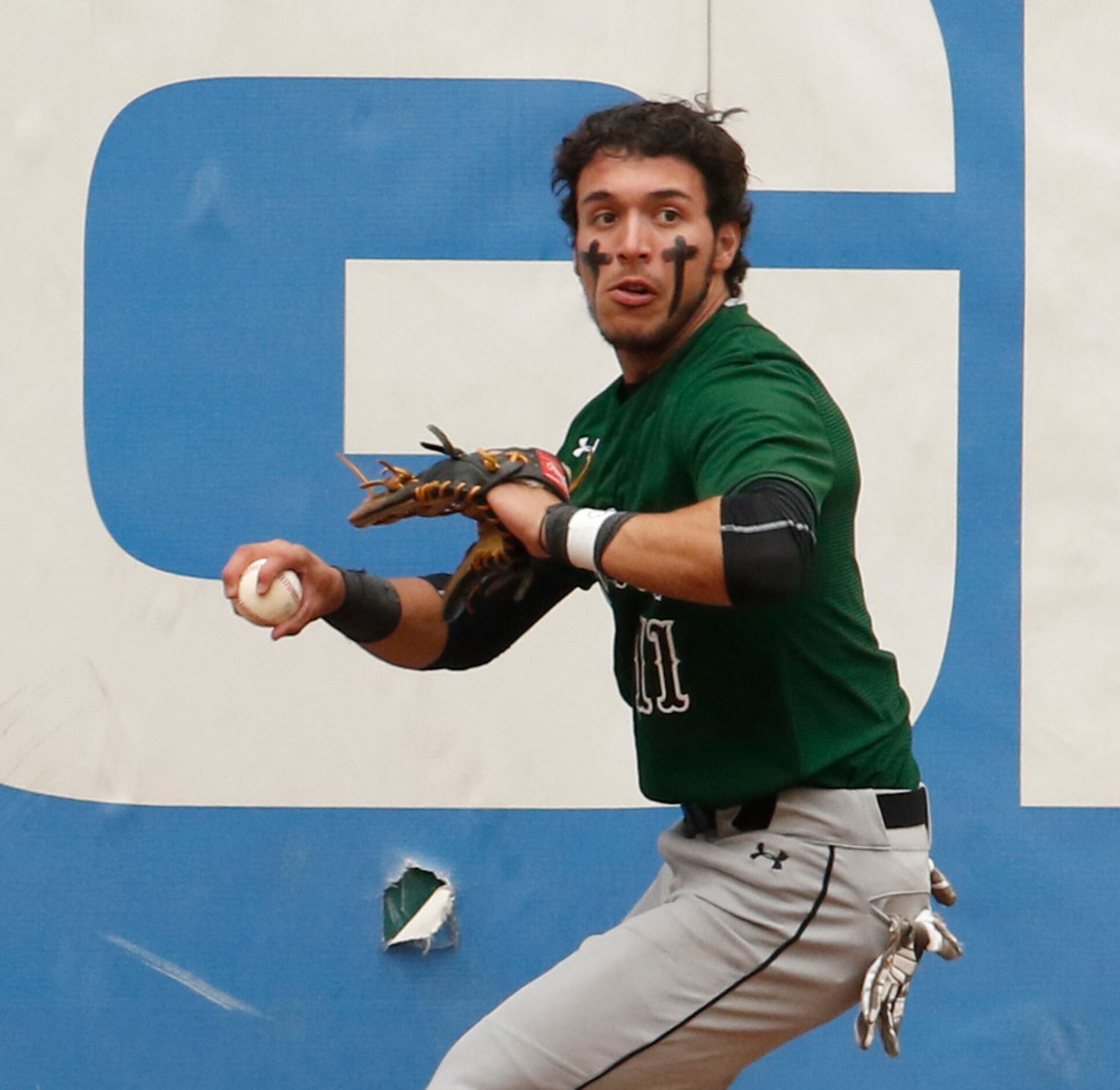 Mansfield Lake Ridge center fielder Conner Ramirez (11) races to retrieve a long drive off...