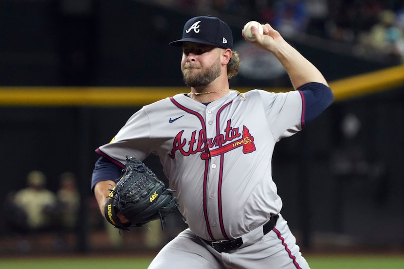 Atlanta Braves pitcher A.J. Minter throws against the Arizona Diamondbacks in the ninth...