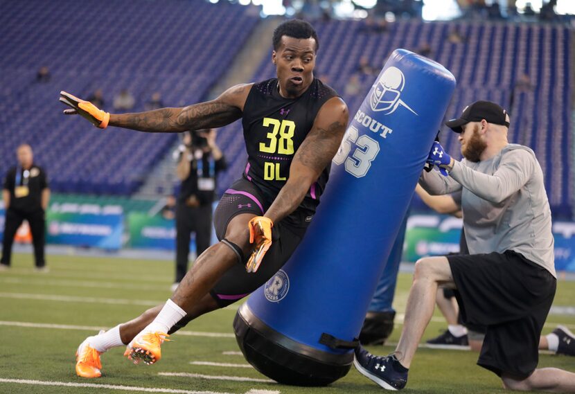 LSU defensive lineman Arden Key runs a drill at the NFL football scouting combine in...