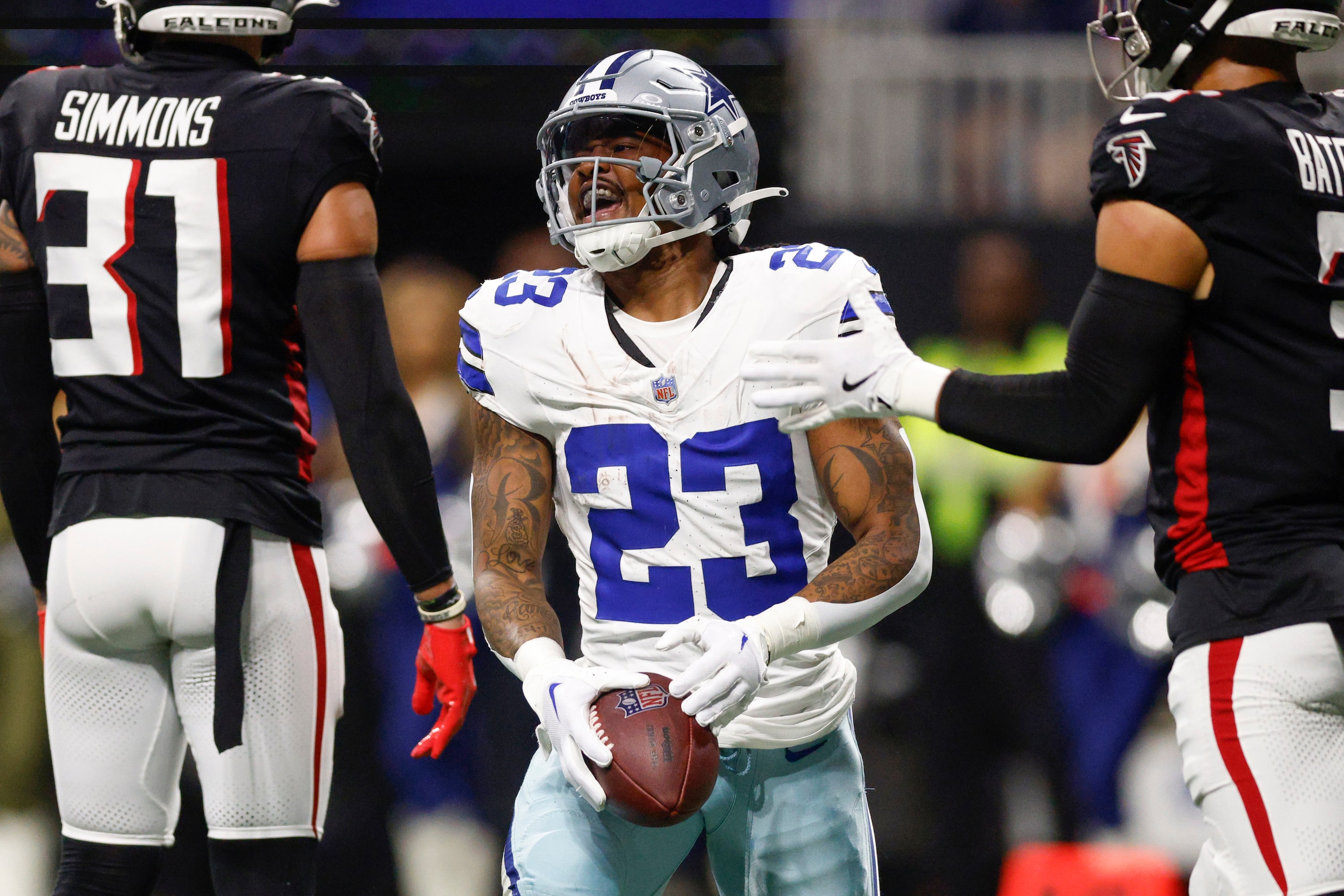 Dallas Cowboys running back Rico Dowdle (23) reacts after being tackled short of the goal...