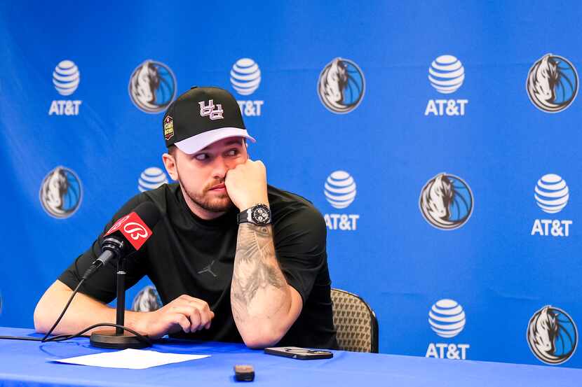 Dallas Mavericks guard Luka Doncic addresses reporters following a season-ending loss to the...