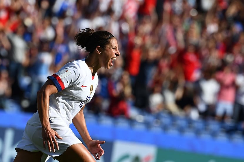 TOPSHOT - United States' forward Carli Lloyd celebrates after scoring a goal during the...