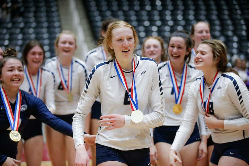 Flower Mound sophomore Kaylee Cox (6) is congratulated by teammates after being named MVP in...