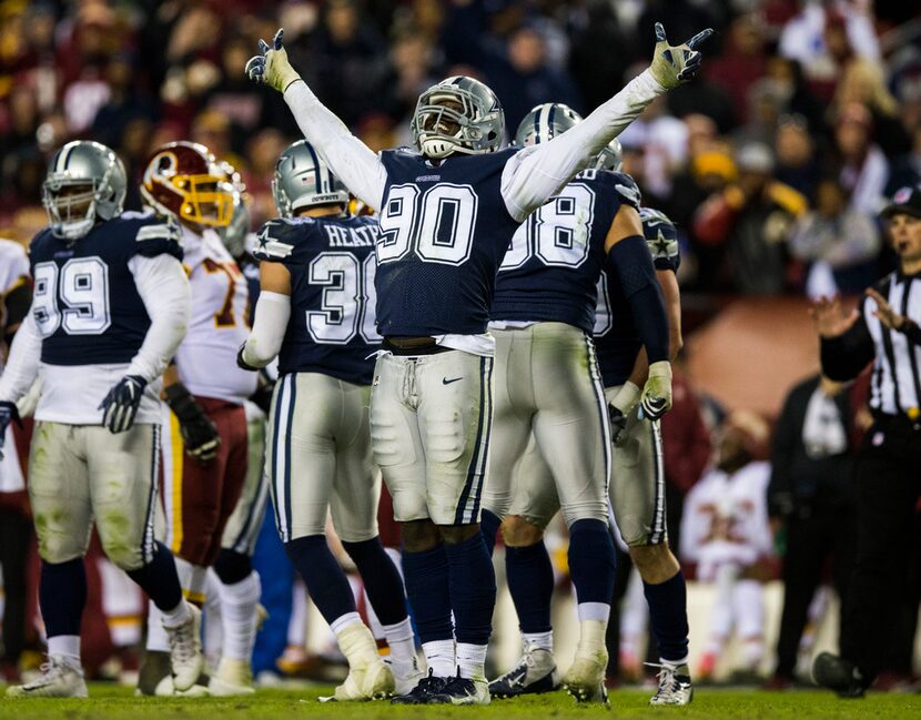 Dallas Cowboys defensive end Demarcus Lawrence (90) celebrates after a tackle during the...