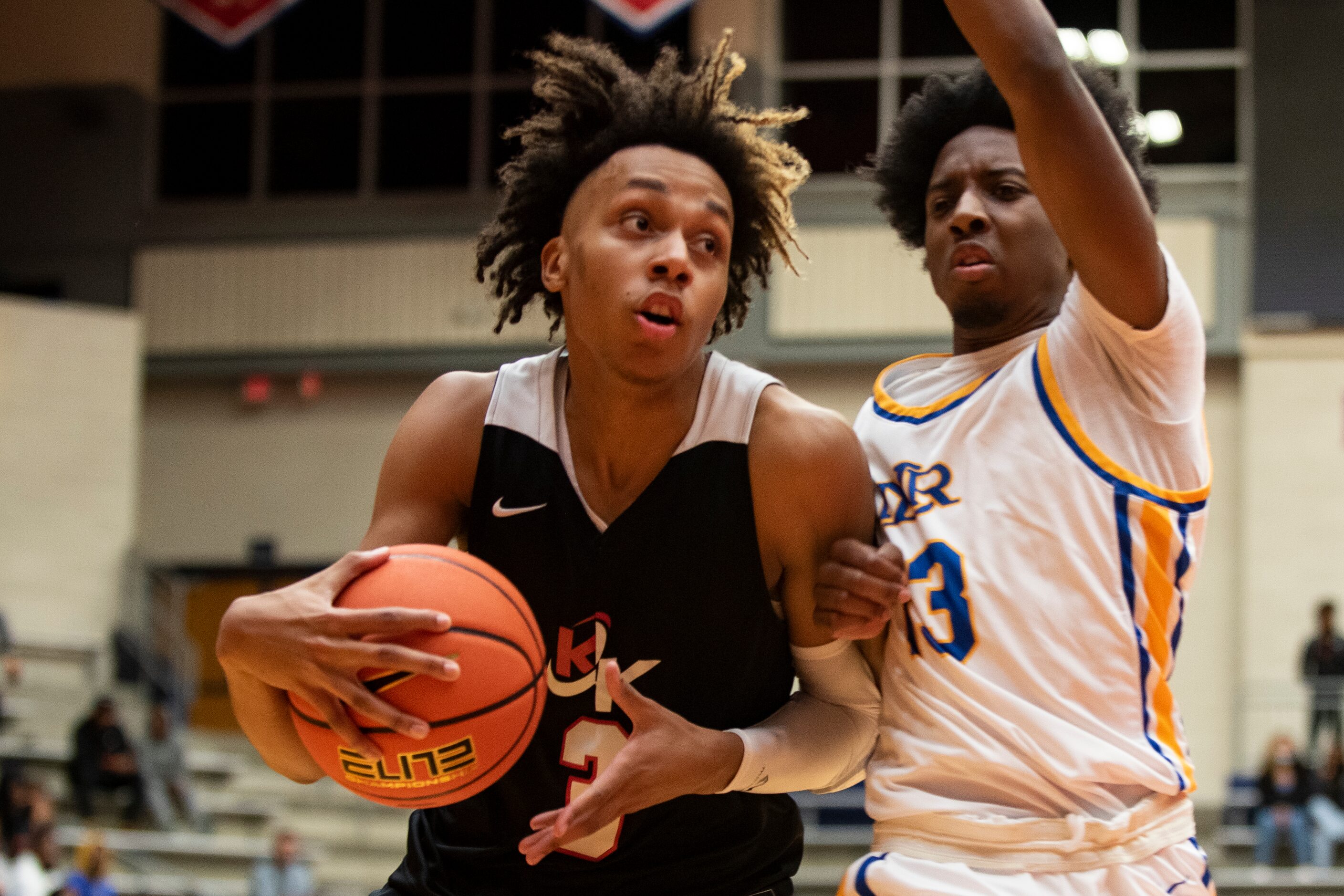 Kimball senior Chauncey Gibson (3) gets past North Little Rock senior Josh Evans (13) during...