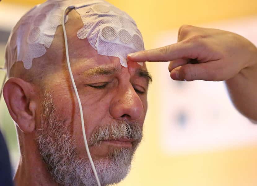 Jeffrey Weiss is fitted with an Optune device as part of his treatment for glioblastoma at...