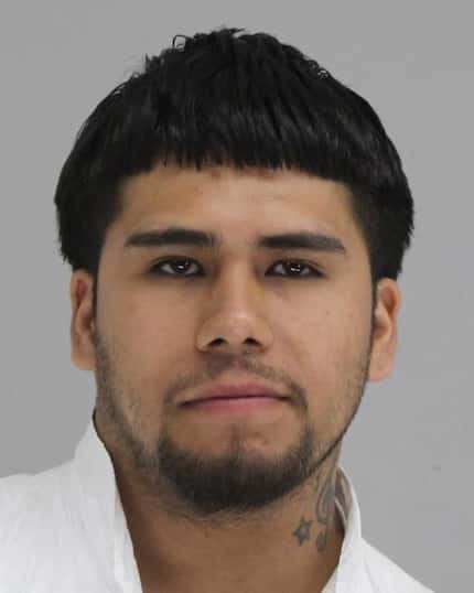 Martin Rocha, who is listed under the alias "Martin Pena" in jail records.