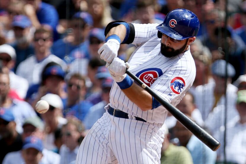 CHICAGO, IL - AUGUST 17:  Alex Avila #13 of the Chicago Cubs hits a home run in the fourth...