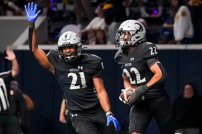 Denton Guyer defensive backs Peyton Bowen (22) and Ryan Yaites (21) celebrate after Bowen...