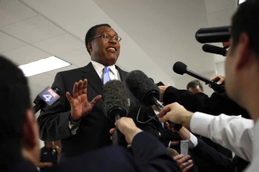 Dallas Mayor Dwaine Caraway talks to reporters after a judge denied his request to block the...