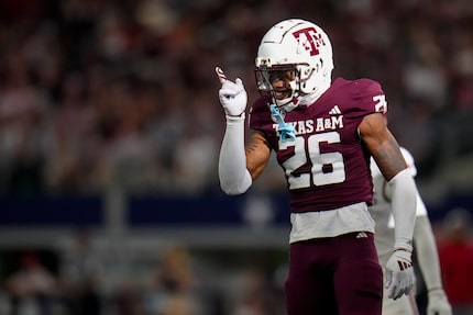 Texas A&M defensive back Will Lee III reacts after a play against Arkansas during the second...