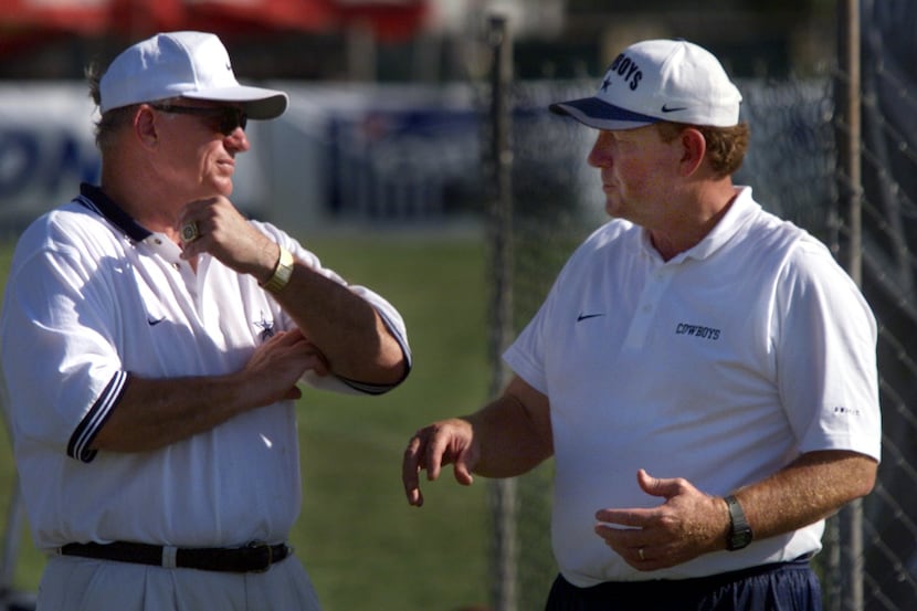 Jerry Jones and Chan Gailey talk after afternoon practice at Dallas Cowboys training camp in...