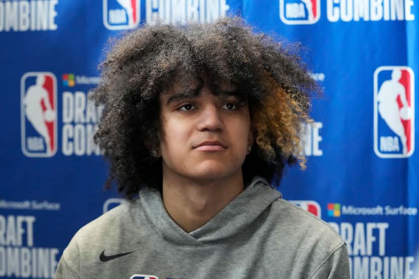 Anthony Black listens to a question from the media during the 2023 NBA basketball Draft...