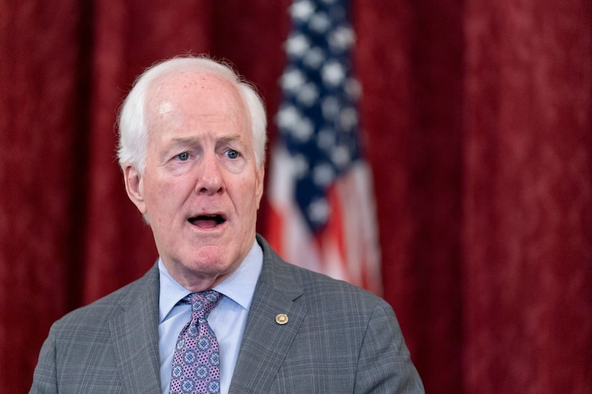 FILE - Sen. John Cornyn, R-Texas, speaks to media, Oct. 18, 2023, on Capitol Hill in...