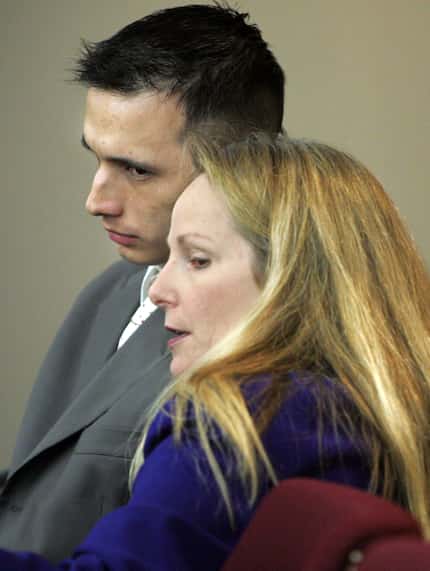 Hector Rolando Medina consults with defense attorney Donna Winfield in September 2008.