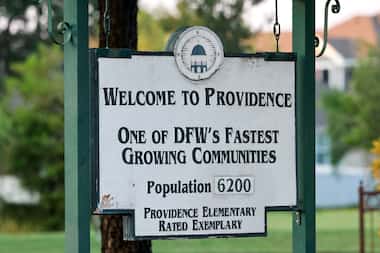 A sign welcomes people to Providence Village on June 21, 2022.